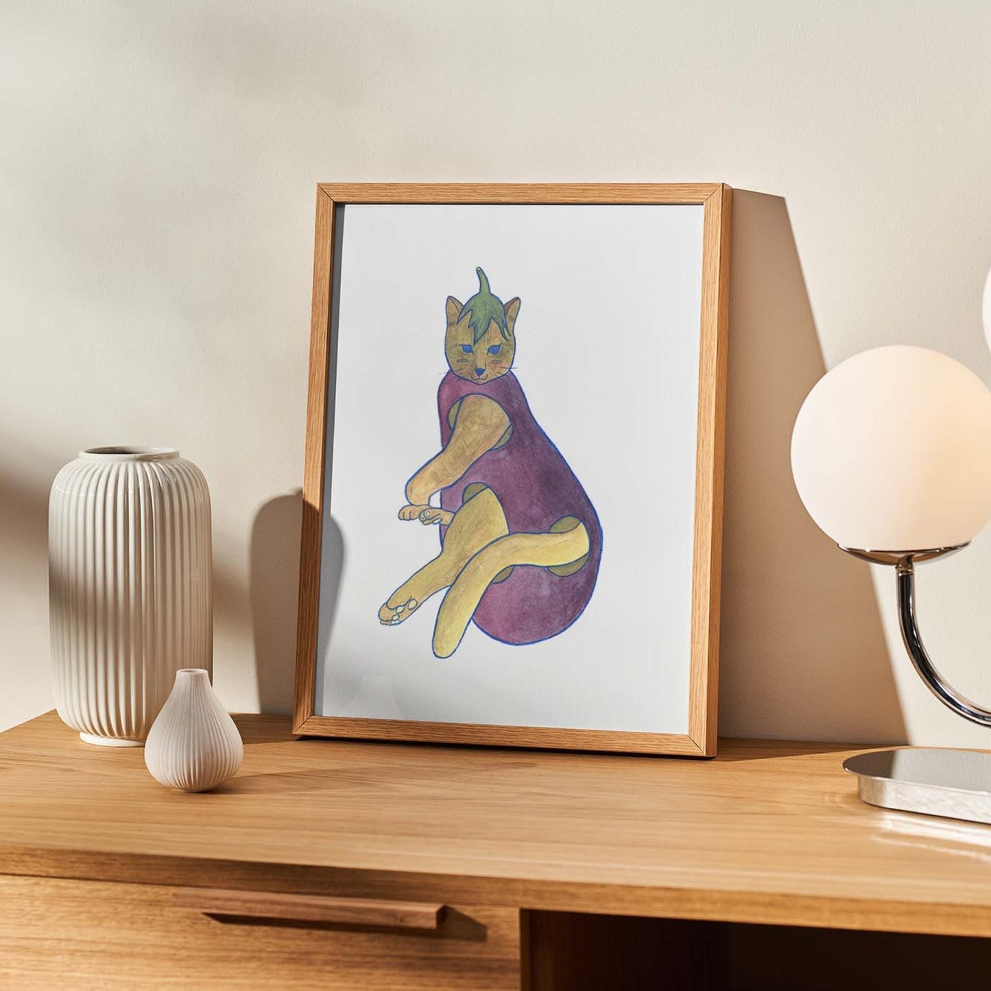 Whimsical fine art print by Christy Chan, an artist based in Antwerp, capturing the charm of a cat adorned in a playful eggplant outfit, adding a touch of humor and personality to the scene